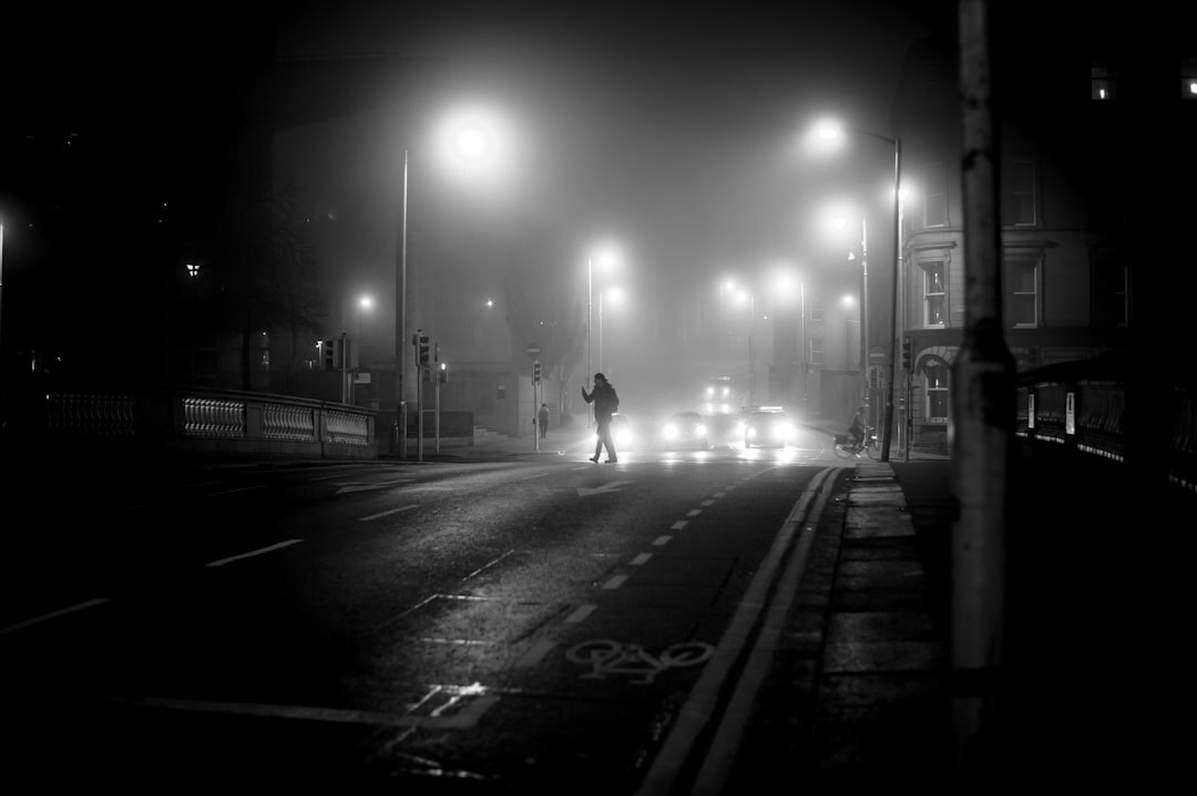 foggy night street with detective